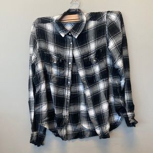 Teen black and white checkered dress shirt. Long sleeved. Snaps. Size small.